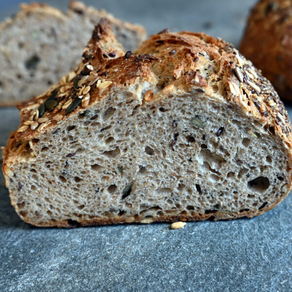 organic wholemeal bread with natural sourdough bran and omega-3 seeds. Stone-ground organic flour. No additives, no preservatives